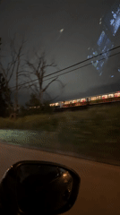 Vehicle records nighttime train travel near New Westminster