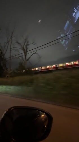 Vehicle records nighttime train travel near New Westminster