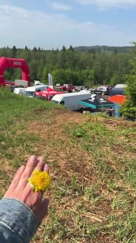 Early morning dirt bike gathering features dandelion picking in Krasnokamsk