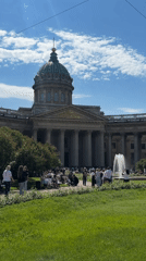 Tourist documents Saint Petersburg landmarks during sunny June morning