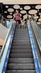 Father and child enjoy morning outing in Sochi shopping district