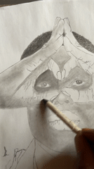 Artist documents portrait drawing process in Jos, Nigeria
