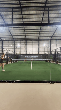Four women play recreational padel match in Ubud, Indonesia
