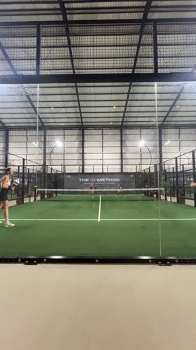 Four women play recreational padel match in Ubud, Indonesia
