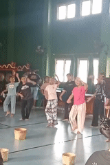 Traditional dance rehearsal with woven baskets, Demak hall