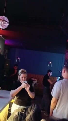 Live singer performs at Baku bar amid atmospheric lighting