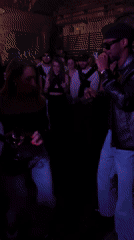 Man performs with microphone at Moscow nightclub