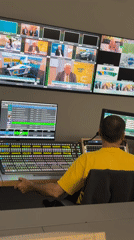 TV technician operates broadcast equipment in Sofia studio