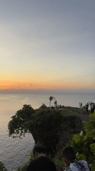 Clifftop wedding ceremony held at sunset in Kuta Selatan