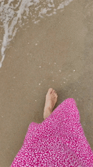 Woman enjoys morning beach activities in Bai Chay Ward, Vietnam