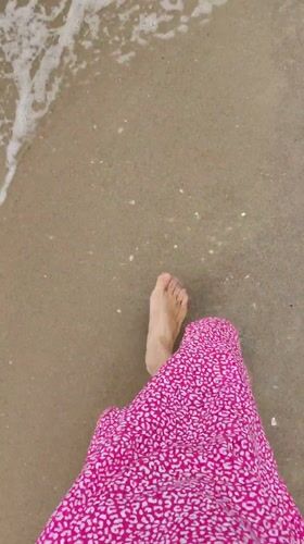 Woman enjoys morning beach activities in Bai Chay Ward, Vietnam