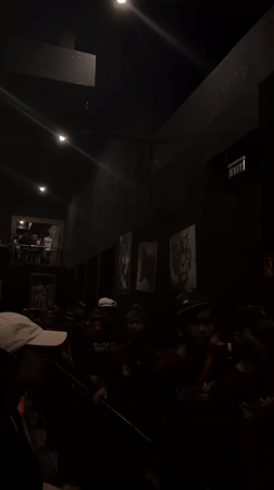 Morning crowds gather in dark industrial venues in North Jakarta