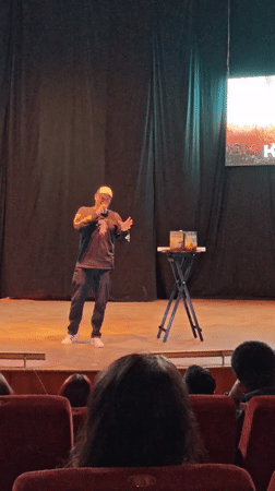 Indoor presentation event with dramatic screen display in Vinnytsia