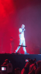Live concert stage moments in Belgrade, red and blue lighting