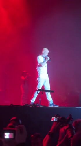 Live concert stage moments in Belgrade, red and blue lighting