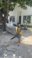 Garden maintenance and yard exploration in Phan Thiet Ward