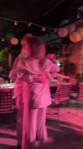 Evening dance gathering with couples in Dobrota, Montenegro