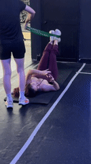Women exercise at Đà Nẵng gym, use phones during workout