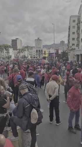 Red-clad crowd gathers on Caracas street