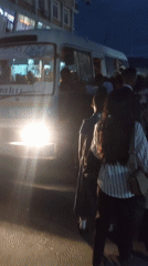 Peanut vendor serves evening customers in Dar es-Salaam