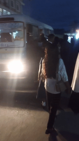 Peanut vendor serves evening customers in Dar es-Salaam