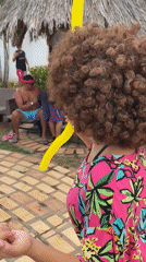 Retro-themed poolside dance party in Porlamar, Venezuela