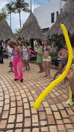 Retro-themed poolside dance party in Porlamar, Venezuela