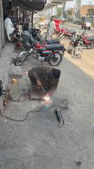 Friday morning street life unfolds across Lahore neighborhoods
