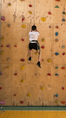 Children practice indoor rock climbing at Izhevsk gym
