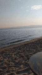 Quiet beachside setup at golden hour, Neoi Epivates