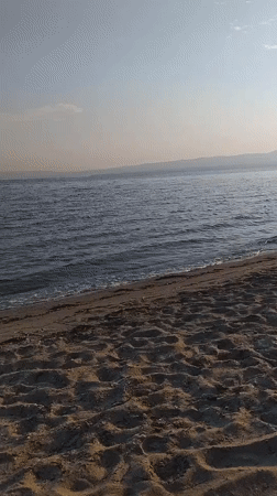 Quiet beachside setup at golden hour, Neoi Epivates