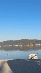 Sailboats moored in calm waters at Fethiye marina
