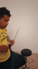 Drummer practices with chocolate cake present in Tinaquillo home