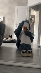 Shark kigurumi mirror selfies captured in Yoshkar-Ola home