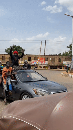 Crowded vehicles, street speakers documented in Bukuru, Nigeria