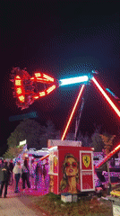 Colorful carnival ride operates at night in Ruse, Bulgaria