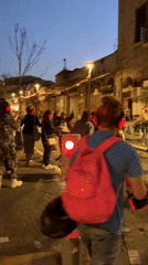 Silent disco and aerial performance enliven Tel-Aviv streets at dusk