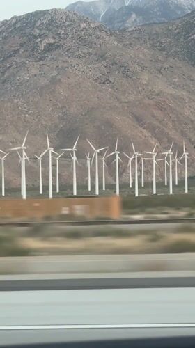 Wind farm observed from moving vehicle near Cabazon