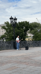 Spring afternoon urban life documented across city bridges and gardens