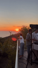 Balcony sunset party with DJ overlooking Montenegro coastline