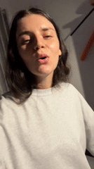 Woman sings, dances, takes selfies in Mũi Né indoor space