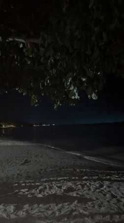 Nighttime coastal scenes captured in Baan Mae Nam, Thailand