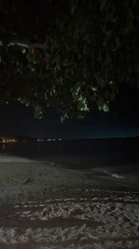 Nighttime coastal scenes captured in Baan Mae Nam, Thailand