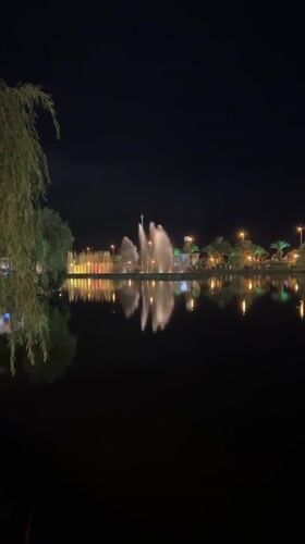Batumi Boulevard lit up along the waterfront at night