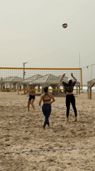 Morning beach recreation in Tel Aviv draws volleyball players