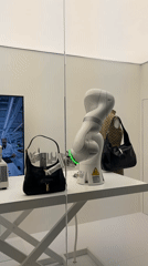 Visitors document fashion and art exhibits at Florence's Gucci Garden
