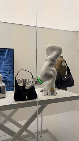 Visitors document fashion and art exhibits at Florence's Gucci Garden