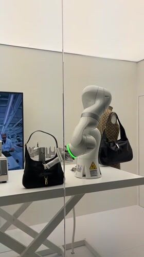 Visitors document fashion and art exhibits at Florence's Gucci Garden