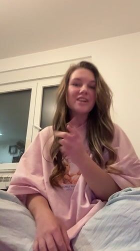 Woman records video message from bedroom in Belgrade suburb