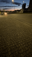 Evening street scenes documented across Bragança, Portugal at dusk